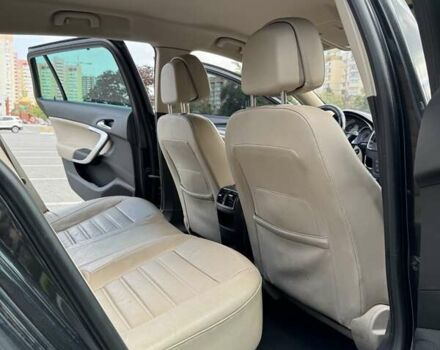 Чорний Опель Інсігнія, об'ємом двигуна 1.96 л та пробігом 237 тис. км за 12000 $, фото 7 на Automoto.ua