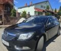 Чорний Опель Інсігнія, об'ємом двигуна 2 л та пробігом 280 тис. км за 8500 $, фото 1 на Automoto.ua
