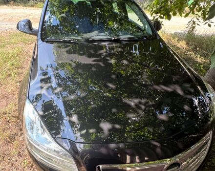 Черный Опель Инсигния, объемом двигателя 2 л и пробегом 254 тыс. км за 7300 $, фото 2 на Automoto.ua