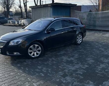 Черный Опель Инсигния, объемом двигателя 1.96 л и пробегом 340 тыс. км за 7500 $, фото 1 на Automoto.ua