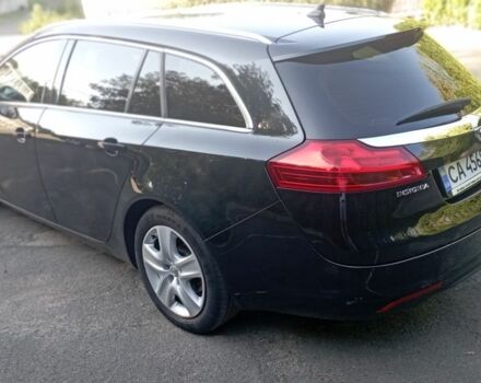 Чорний Опель Інсігнія, об'ємом двигуна 2 л та пробігом 236 тис. км за 8800 $, фото 2 на Automoto.ua