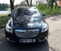 Черный Опель Инсигния, объемом двигателя 2 л и пробегом 222 тыс. км за 9300 $, фото 1 на Automoto.ua