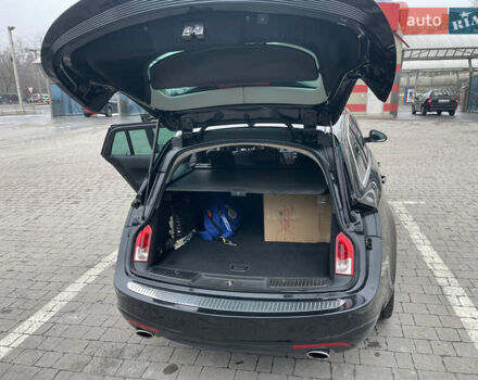 Черный Опель Инсигния, объемом двигателя 2 л и пробегом 180 тыс. км за 9400 $, фото 81 на Automoto.ua