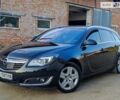 Черный Опель Инсигния, объемом двигателя 2 л и пробегом 295 тыс. км за 9000 $, фото 1 на Automoto.ua
