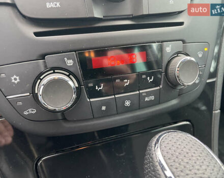 Черный Опель Инсигния, объемом двигателя 2 л и пробегом 180 тыс. км за 9400 $, фото 125 на Automoto.ua