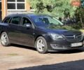 Чорний Опель Інсігнія, об'ємом двигуна 2 л та пробігом 293 тис. км за 9900 $, фото 1 на Automoto.ua