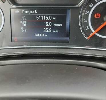 Чорний Опель Інсігнія, об'ємом двигуна 2 л та пробігом 240 тис. км за 10100 $, фото 1 на Automoto.ua