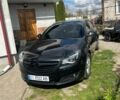 Чорний Опель Інсігнія, об'ємом двигуна 1.96 л та пробігом 252 тис. км за 8900 $, фото 1 на Automoto.ua