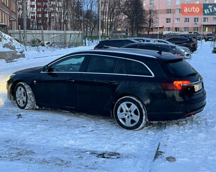 Чорний Опель Інсігнія, об'ємом двигуна 1.96 л та пробігом 172 тис. км за 10400 $, фото 5 на Automoto.ua