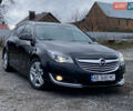 Чорний Опель Інсігнія, об'ємом двигуна 1.96 л та пробігом 170 тис. км за 11900 $, фото 4 на Automoto.ua