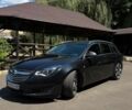 Чорний Опель Інсігнія, об'ємом двигуна 1.96 л та пробігом 297 тис. км за 11000 $, фото 1 на Automoto.ua
