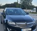 Чорний Опель Інсігнія, об'ємом двигуна 2 л та пробігом 243 тис. км за 9499 $, фото 1 на Automoto.ua