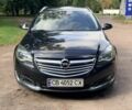 Чорний Опель Інсігнія, об'ємом двигуна 2 л та пробігом 293 тис. км за 9954 $, фото 1 на Automoto.ua