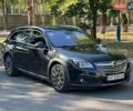 Чорний Опель Інсігнія, об'ємом двигуна 1.96 л та пробігом 240 тис. км за 14500 $, фото 1 на Automoto.ua