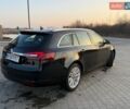 Чорний Опель Інсігнія, об'ємом двигуна 1.96 л та пробігом 259 тис. км за 10400 $, фото 6 на Automoto.ua