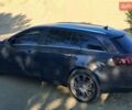 Чорний Опель Інсігнія, об'ємом двигуна 2 л та пробігом 272 тис. км за 9100 $, фото 6 на Automoto.ua