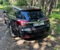 Чорний Опель Інсігнія, об'ємом двигуна 2 л та пробігом 285 тис. км за 13111 $, фото 3 на Automoto.ua