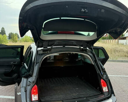 Черный Опель Инсигния, объемом двигателя 1.96 л и пробегом 230 тыс. км за 12000 $, фото 10 на Automoto.ua