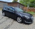 Чорний Опель Інсігнія, об'ємом двигуна 2 л та пробігом 365 тис. км за 7836 $, фото 1 на Automoto.ua