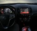 Чорний Опель Інсігнія, об'ємом двигуна 2 л та пробігом 266 тис. км за 8400 $, фото 6 на Automoto.ua