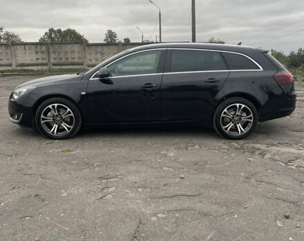 Чорний Опель Інсігнія, об'ємом двигуна 2 л та пробігом 233 тис. км за 12888 $, фото 5 на Automoto.ua