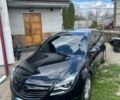 Чорний Опель Інсігнія, об'ємом двигуна 1.96 л та пробігом 252 тис. км за 8900 $, фото 1 на Automoto.ua