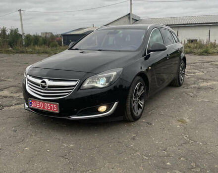 Чорний Опель Інсігнія, об'ємом двигуна 2 л та пробігом 233 тис. км за 12888 $, фото 1 на Automoto.ua