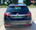 Чорний Опель Інсігнія, об'ємом двигуна 1.96 л та пробігом 218 тис. км за 9490 $, фото 8 на Automoto.ua