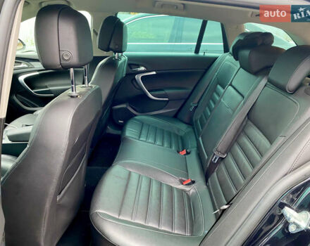 Чорний Опель Інсігнія, об'ємом двигуна 1.96 л та пробігом 170 тис. км за 11900 $, фото 11 на Automoto.ua