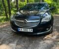 Чорний Опель Інсігнія, об'ємом двигуна 2 л та пробігом 285 тис. км за 14000 $, фото 1 на Automoto.ua