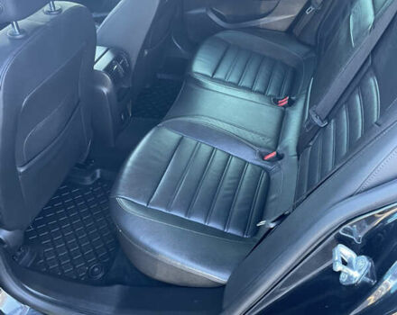 Чорний Опель Інсігнія, об'ємом двигуна 2 л та пробігом 233 тис. км за 12888 $, фото 32 на Automoto.ua