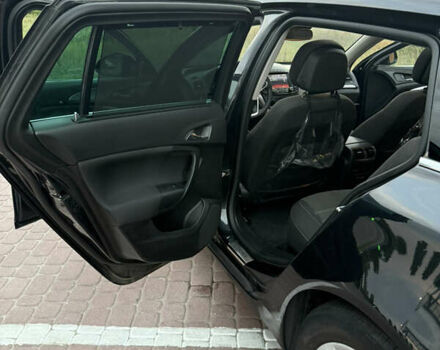 Черный Опель Инсигния, объемом двигателя 1.96 л и пробегом 230 тыс. км за 12000 $, фото 9 на Automoto.ua