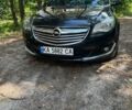 Чорний Опель Інсігнія, об'ємом двигуна 1.96 л та пробігом 285 тис. км за 13075 $, фото 1 на Automoto.ua