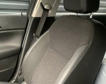 Чорний Опель Інсігнія, об'ємом двигуна 1.96 л та пробігом 193 тис. км за 10700 $, фото 5 на Automoto.ua