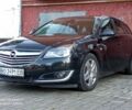 Черный Опель Инсигния, объемом двигателя 2 л и пробегом 205 тыс. км за 10000 $, фото 1 на Automoto.ua