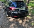 Чорний Опель Інсігнія, об'ємом двигуна 1.96 л та пробігом 285 тис. км за 13075 $, фото 3 на Automoto.ua