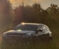 Черный Опель Инсигния, объемом двигателя 2 л и пробегом 299 тыс. км за 8399 $, фото 1 на Automoto.ua