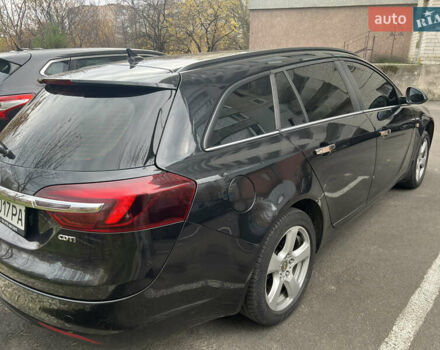 Черный Опель Инсигния, объемом двигателя 1.96 л и пробегом 285 тыс. км за 9800 $, фото 5 на Automoto.ua