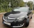 Черный Опель Инсигния, объемом двигателя 2 л и пробегом 280 тыс. км за 12500 $, фото 1 на Automoto.ua