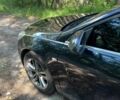 Чорний Опель Інсігнія, об'ємом двигуна 2 л та пробігом 285 тис. км за 13111 $, фото 2 на Automoto.ua