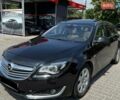 Чорний Опель Інсігнія, об'ємом двигуна 1.96 л та пробігом 278 тис. км за 9100 $, фото 1 на Automoto.ua