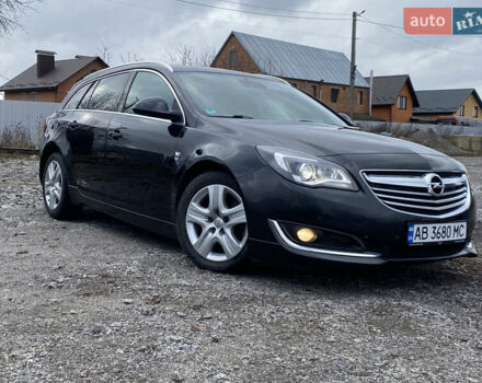 Чорний Опель Інсігнія, об'ємом двигуна 1.96 л та пробігом 170 тис. км за 11900 $, фото 2 на Automoto.ua