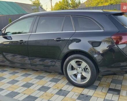 Черный Опель Инсигния, объемом двигателя 1.96 л и пробегом 322 тыс. км за 10400 $, фото 2 на Automoto.ua