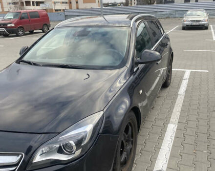 Чорний Опель Інсігнія, об'ємом двигуна 1.96 л та пробігом 242 тис. км за 10600 $, фото 1 на Automoto.ua