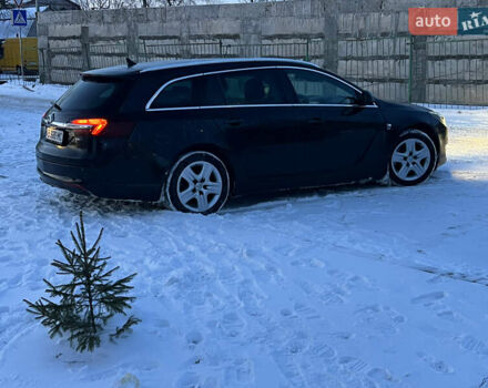 Чорний Опель Інсігнія, об'ємом двигуна 1.96 л та пробігом 172 тис. км за 10400 $, фото 8 на Automoto.ua