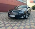 Чорний Опель Інсігнія, об'ємом двигуна 1.96 л та пробігом 350 тис. км за 9000 $, фото 1 на Automoto.ua