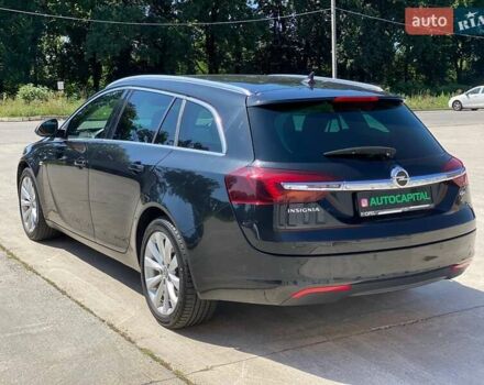 Чорний Опель Інсігнія, об'ємом двигуна 1.96 л та пробігом 218 тис. км за 9490 $, фото 10 на Automoto.ua