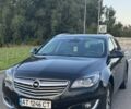 Черный Опель Инсигния, объемом двигателя 2 л и пробегом 260 тыс. км за 8727 $, фото 1 на Automoto.ua