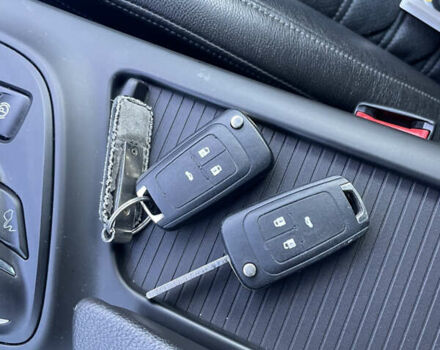 Чорний Опель Інсігнія, об'ємом двигуна 2 л та пробігом 233 тис. км за 12888 $, фото 41 на Automoto.ua