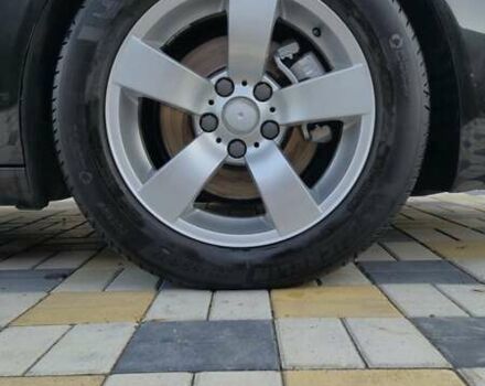 Черный Опель Инсигния, объемом двигателя 1.96 л и пробегом 322 тыс. км за 10400 $, фото 6 на Automoto.ua